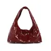 Bolso de hombro versátil, simple y chic, de diseño de nicho muy elegante, con tachuelas, nueva moda de tendencia primavera-verano 2026