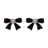 Pendientes de lazo de flocking dulce francés con circonita, elegantes, de lujo ligero, de alta gama, de moda, combinan con todo, tachuelas para orejas de dama