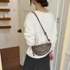 Bolsa de ombro de design nicho transfronteiriça para mulheres, nova bolsa transversal sela retrô versátil da moda outono 2026