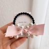 Niña Coreana Linda Banda Elástica para el Cabello Cuerda para el Cabello de Celebridad de Internet Cinta de Moño de Perla Accesorios para el Cabello Estilo Retro Chanel