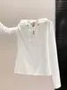 Camiseta de manga larga con capucha y media cremallera para mujer 2026 nueva moda ajustada versátil top base ajustado A13360