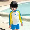 Maiô Infantil de Manga Longa Verão 2025 Novo Estilo Calça de Praia à Beira-Mar Traje de Banho Dividido para Meninos Proteção Solar Secagem Rápida Resistente ao Cloro