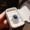 Anillo Abierto Geométrico Ovalado de Flor de Circonita de Lujo Accesible Estilo Palacio Nicho de Gama Alta Elegante Joyería de Mano para Mujeres
