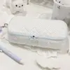 Nuevo estuche de lunares con forma de corazón de alto atractivo estético, bolsa para lápices con lazo, bolsa de almacenamiento de papelería de gran capacidad para estudiantes