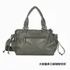 Nova bolsa tote feminina de grande capacidade com um design exclusivo texturizado em pedra e plissado, apresentando múltiplos bolsos, adequada para o trajeto diário e pode ser carregada como bolsa de ombro ou bolsa transversal.
