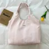 Shuai Mijia 2026 Verão Nova Bolsa de Mão Listrada Estilo Ins Simples e Estilosa Bolsa Tote Portátil para Lancheira para Mulheres