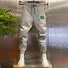 Verano 2023 nuevos pantalones casuales de malla para hombre, combinan con todo, con cordón en el tobillo, pantalones deportivos, marca de moda, pantalones de chándal para jóvenes