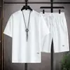 Traje deportivo de verano para hombre de manga corta transfronterizo, camiseta de color liso de corte holgado y pantalones cortos, tejido gofrado, conjunto versátil de moda casual para hombre