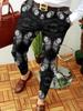 2022 Novo Calça Casual Masculina Transfronteiriça Europeia e Americana com Estampa Abstrata de Cores Contrastantes Cintura Média Calça Casual Microelástica