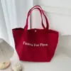 Bolso de Lona de Color Sólido con Letras para Viajes Diarios de Mujer 2026 Nuevo Bolso Cruzado Casual de Gran Capacidad Bolso de Mano para Estudiantes