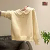 Suéter de punto para mujer con cuello de muñeca de encaje mullido transfronterizo, nuevo estilo primavera 2026, adecuado para usar en capas o solo, con un ambiente casual, suéter de punto para invierno