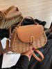 Bolso de paja tejida para mujer, diseño de nicho, nuevo bolso bandolera de primavera y verano 2025, bolso de playa portátil para vacaciones en la playa.