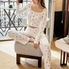Nuevo conjunto de pijama de punto largo estampado para otoño e invierno para mujer, cómodo y agradable para la piel, ropa de casa, estilo europeo y americano, disponible para venta al por mayor