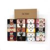 Calcetines de lana en caja calcetines cálidos de invierno para mujer engrosados de media pantorrilla calcetines en caja de regalo calcetines de lana para hombre en caja