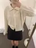 2026 Novo Suéter Curto Liso com Recortes Manga Curta Feminino Combinado com Cardigan Tricotado de Estilo Suave Manga Longa Feminino