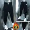 Calças casuais de inverno masculinas estilo coreano calças esportivas da moda com forro de lã calças da moda de nove comprimentos calças elásticas masculinas