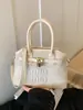 Bolso Súper Popular de Comercio Exterior con Forma de Concha Nuevo Modelo 2026 Versátil Bolso Cruzado de Cuadros Bolso de Hombro de Nicho de Alto Valor Estilo Americano