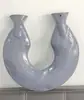 Calentador de cuello con bolsa de agua caliente en forma de U, relleno de agua para protección del cuello y los hombros, proporcionando calor al cuello y la columna cervical, una bolsa de agua caliente para calentar los pies y las manos, un nuevo diseño de invierno