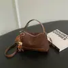 Bolso tipo almohada de cuero suave de alta gama, súper popular, estilo coreano, para mujer, nueva moda 2026, versátil, de gran capacidad, para hombro y cruzado