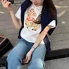 Camiseta da Moda Estilo Coreano com Gola Redonda e Manga Curta para Mulheres 2026 Nova Coleção Primavera com Padrão de Pônei Branco Camiseta Base