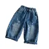 Calça Longa Infantil 2026 Outono Novidades Meninos e Meninas Patchwork Solta Jeans Estampado Bebê Estilo Coreano Calça Estrela