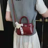 Bolso plateado para mujer 2026 nuevo de moda primavera-verano bolso de mano de alta gama bolso tipo cubo para el uso diario bolso de hombro y cruzado