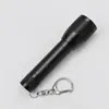 Linterna de llavero mini portátil de alta intensidad de aleación de aluminio, superventas transfronteriza, ideal para iluminación de emergencia al aire libre e iluminación de luz blanca