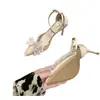 Colección de verano 2026: Zapatos de tacón alto para mujer con detalles de lazo y hebilla, estilo europeo y americano, tacones de aguja elegantes, adecuados para uso tanto en interiores como en exteriores, diseño de punta poco profunda, zapatos de moda para mujer