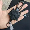 Personalizado de fábrica mosquetón de hebilla de tracción fácil para montañismo al aire libre clip de insignia de cable de acero clip trasero de cinturón llavero telescópico automático venta al por mayor