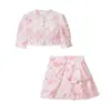 Ins estilo europeu e americano 2026 nova moda temperamento feminino roupas atacado deslocamento top estampado saia plissada conjunto