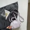Bolsa de Bowling Feminina 2026 Nova Alta Aparência Cor Azul Claro Color Block Bolsa de Mão Moda Bolsa de Ombro Único Bolsa Transversal para o Trabalho