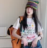 Conjunto de Verano para Niñas 2026 Nuevo Conjunto de Dos Piezas con Camiseta Estampada de Letras y Pantalones Cortos para Niños Mayores Jeans Vintage