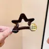 Presilha de Cabelo Dourada Estrela Estilo Coreano para Mulheres 2026 Novo Modelo, Pente Elegante de Alta Qualidade, Acessório de Cabelo Versátil de Luxo