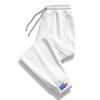 Calças Casuais Masculinas Primavera e Outono Nova Moda Versátil Soltas Jovens Calças Esportivas Nove Pontas Calças de Moletom Masculinas Jovens