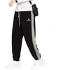 Pantalones casuales de pana para hombre Otoño e Invierno con forro polar Engrosados Holgados Deportivos Marca de Moda Elásticos Juveniles Pantalones Largos