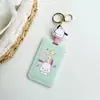 Sanrio parchia cachorro pudim Yugui cachorro estudante cartão de refeição cartão de ônibus conjunto polvo do metrô bolsa de cartão anti-perda pingente