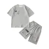 Conjunto de Manga Corta para Niños 2026 Nuevo Verano Waffle Infantil Casual Moderno Dos Piezas Atuendo de Verano para Niños Mayores