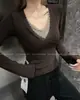 Otoño 2026 Nuevo Temperamento Retro Encaje Patchwork Falso Dos Piezas Cuello en V Manga Larga Camiseta Versátil Top Pequeño Top para Mujer