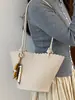 Bolso de cubo de nicho transfronterizo para mujer, nuevo bolso de mano versátil de moda 2026 con patrón de lichi, bolso de hombro cruzado