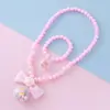 Nuevo Conjunto de Pulsera y Collar de Cuentas de Tierra Lazo Lindo Cuentas Transparente Bola Malvavisco Colgante Collar Al por Mayor