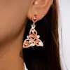 Pendientes de aguja plateada con borla hueca floral circular tachonada de diamantes, pendientes de estilo corte vintage, sensación de lujo ligero y alta gama
