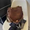Bolso Cubo de Gama Alta para Mujer 2025 Nueva Moda Bolso de Hombro Único Cruzado Versátil Elegante para el Trabajo PU Bolso de Mujer
