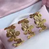 Pulsera floral retro elegante nueva europea y americana no se decolora oro de 18K apertura ajustable pulsera de acero de titanio joyería para mujeres