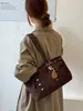 Bolsa Tote Versátil de Gran Capacidad con Remaches para Mujer, Estilo Coreano Nuevo Otoño 2026, Adecuada para Viajes Diarios, Viajes y Salidas