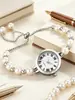 Pulsera de perlas superventas transfronteriza, reloj de cuarzo con números romanos para mujer, disponible en stock, tres colores para elegir