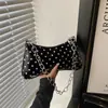 Bolso de hombro y cruzado de moda de lunares transfronterizo súper popular, nuevo modelo 2026, de alta gama, nicho, versátil para el día a día.