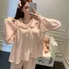 Nuevos pijamas de doble cara de terciopelo de isla para otoño para mujer, nuevo diseño de encaje de color liso de manga larga y pantalón largo con cuello de muñeca para casa, estilo dulce
