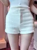 Shorts de lana de cintura alta de moda para mujer, nuevo estilo otoño e invierno 2026, ajustados sexy, engrosados, línea A, casual, pantalones cortos ajustados