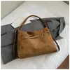Bolso Tote Casual y Sencillo para Viajeros para Mujer 2025 Invierno Nuevo Textura de Alta Calidad y Versátil Bolso de Hombro Único Sobaco