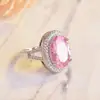 E-commerce transfronteiriço fornecimento atacado anel de ovo de ganso cristal rosa imitação diamante total r5236 anel de noivado diamante em pó